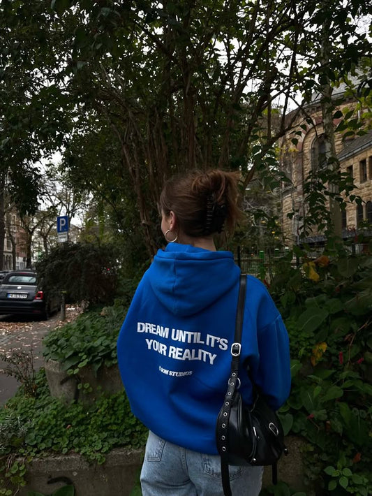 Blue Hoodie with “Dream Until It’s Your Reality” Print