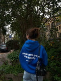 Blue Hoodie with “Dream Until It’s Your Reality” Print